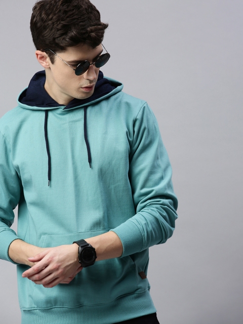 

Roadster Men Blue Solid Hooded Sweatshirt