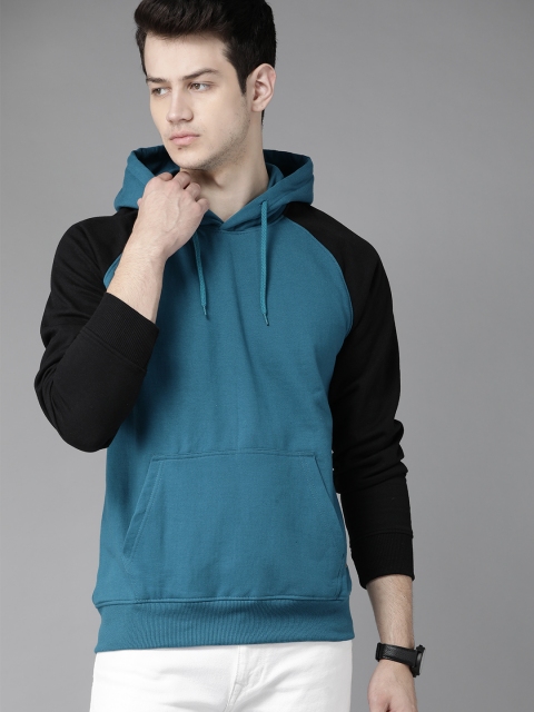 

Roadster Men Blue Solid Hooded Sweatshirt