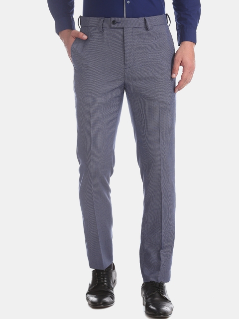 

Arrow Men Blue Tapered Fit Self Design Regular Trousers