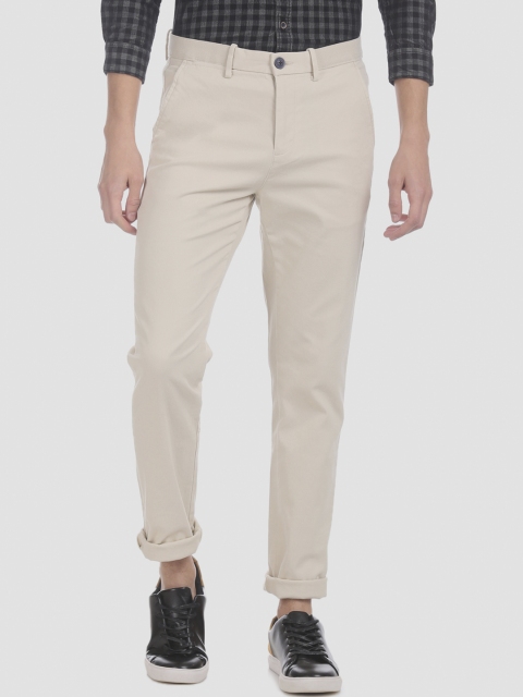 

RUF & TUF Men Beige Slim Fit Solid Regular Trousers