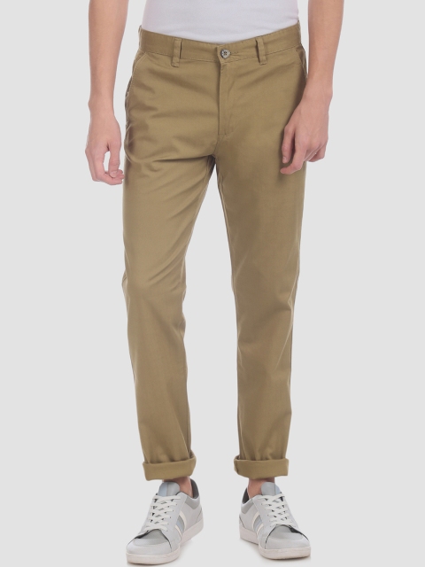 

RUF & TUF Men Beige Slim Fit Solid Regular Trousers