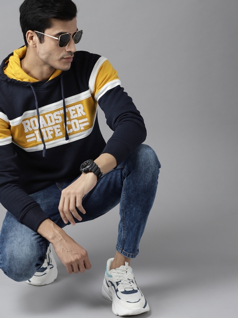 

Roadster Men Navy Blue & Mustard Yellow Colourblocked Brand Logo Hooded Sweatshirt