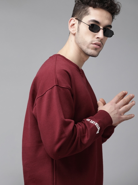 

Roadster Men Maroon Solid Pullover Sweatshirt