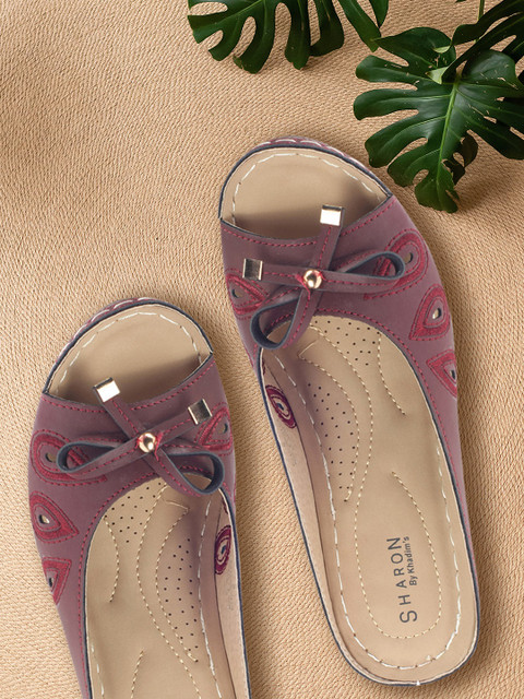 

Khadims Women Red Woven Design Mules