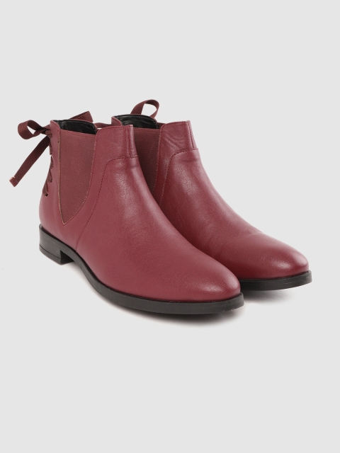

Roadster Women Maroon Solid Mid-Top Flat Boots