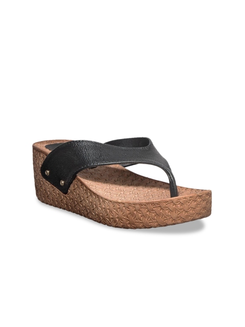 

Khadims Women Black Solid Wedges