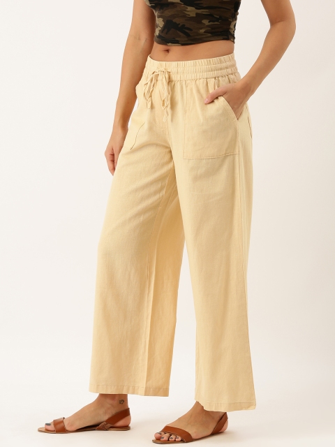 

Moda Rapido Women Beige Loose Fit Solid Parallel Trousers