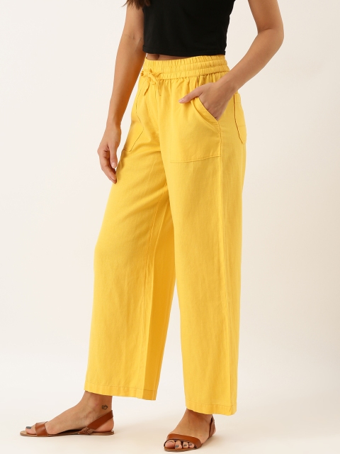 

Moda Rapido Women Yellow Flared Solid Parallel Trousers