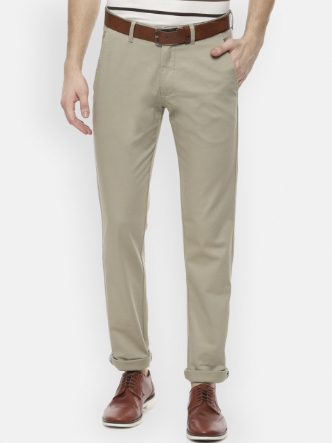 

Van Heusen Sport Men Beige Slim Fit Solid Regular Trousers