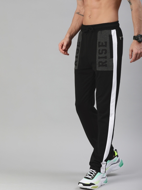 

HERE&NOW Men Black Solid Track Pants with Side Stripes