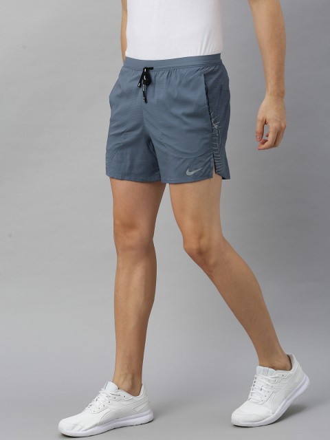 

Nike Men Blue Solid AS NK FLEX STRIDE 5IN DRI-FIT Regular Fit Running Shorts