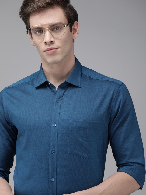 

Park Avenue Men Teal Blue Slim Fit Solid Formal Shirt