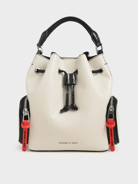 

CHARLES & KEITH Cream-Coloured Solid Handheld Bag