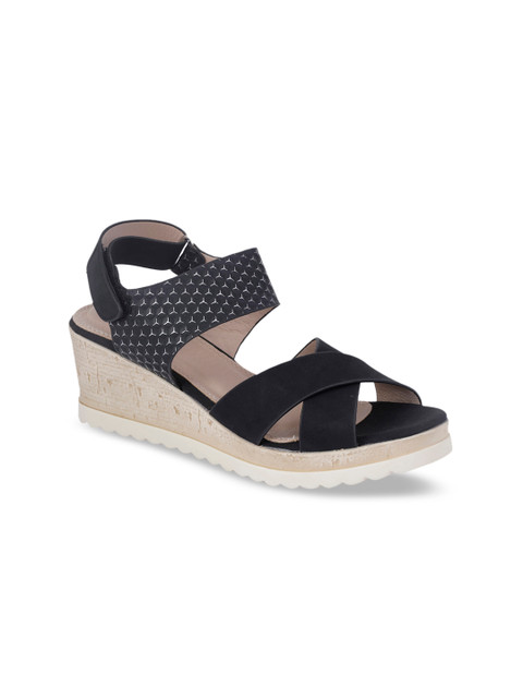

Khadims Women Black Solid Sandals
