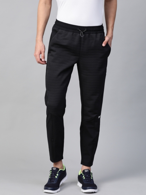 

Reebok Men Black Solid TS Thermowarm Deltapeak Training Track Pants