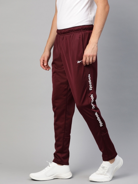 

Reebok Men Burgundy Solid Training Essentials Track Pants
