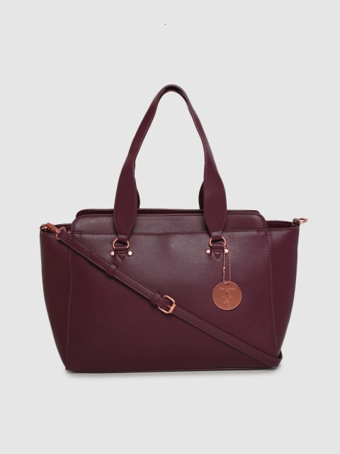 

Caprese Maroon Solid Handheld Bag