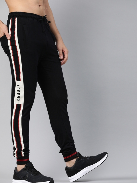 

Kook N Keech Men Black Solid Track Pants with Side Stripes