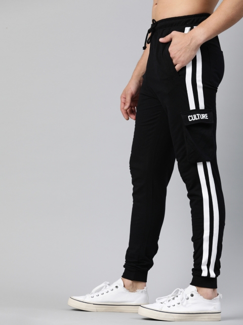 

Kook N Keech Men Black Solid Track Pants with Side Stripes