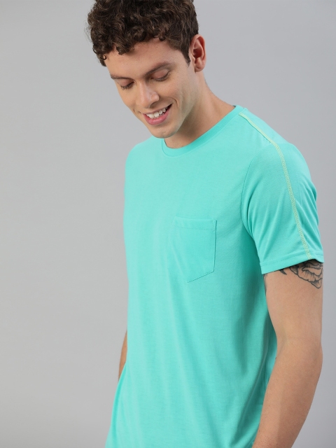 

Mast & Harbour Men Turquoise Blue Solid Round Neck Sustainable T-shirt