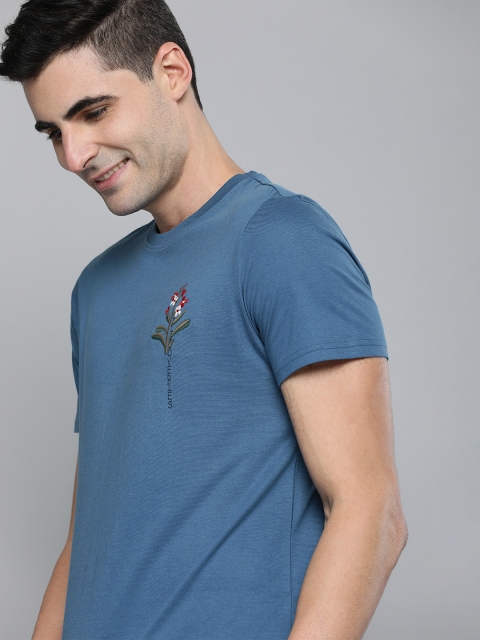 

Mast & Harbour Men Blue Solid Round Neck T-shirt With Embroidery Detail