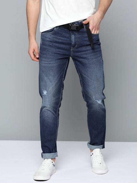 

Mast & Harbour Men Navy Blue Carrot Fit Mid-Rise Low Distress Stretchable Jeans