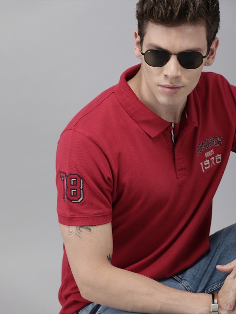 

Roadster Men Coral Red Solid Polo Collar T-shirt
