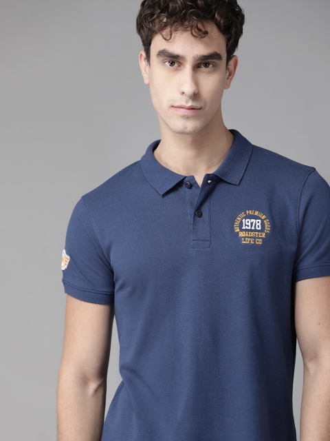 

Roadster Men Navy Blue Solid Polo Collar T-shirt