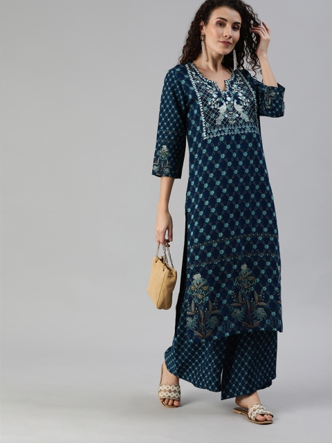 

Ishin Women Blue Embroidered Kurta with Palazzos