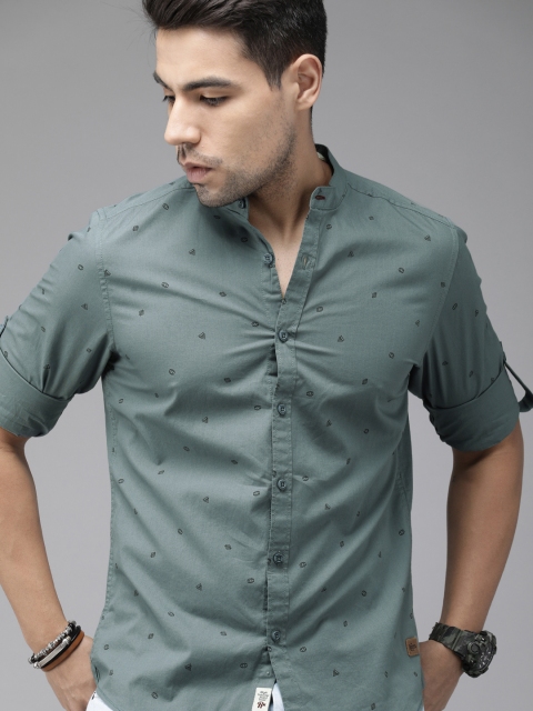 

Roadster Men Teal Blue & Black Regular Fit Printed Casual Shirt