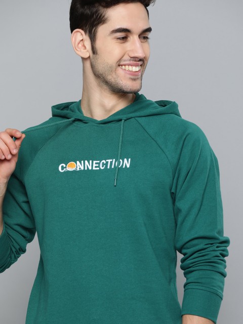 

Mast & Harbour Men Green Solid Hooded Sweatshirt