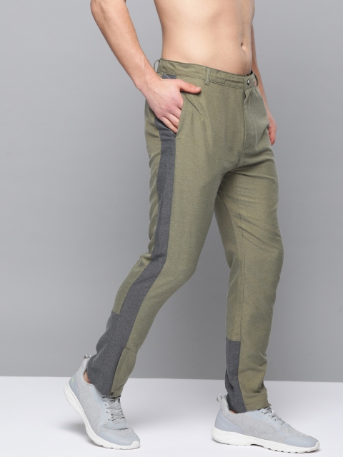 

HRX by Hrithik Roshan Men Winter Moss Solid Slim Fit Rapid-Dry Lifestyle Trousers, Olive