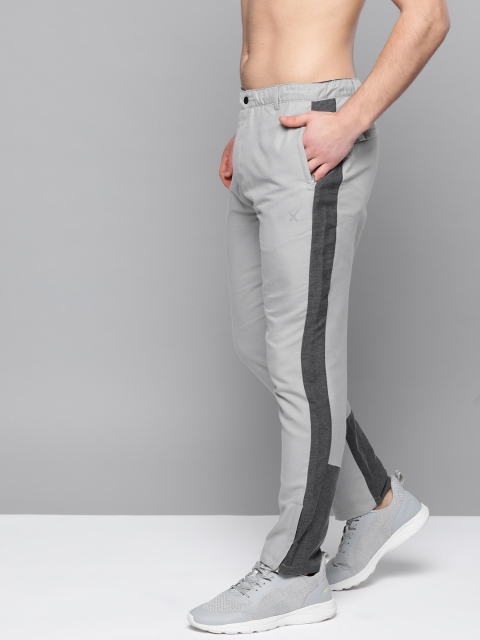 

HRX by Hrithik Roshan Men Grey Melange Solid Slim Fit Rapid-Dry Lifestyle Trousers