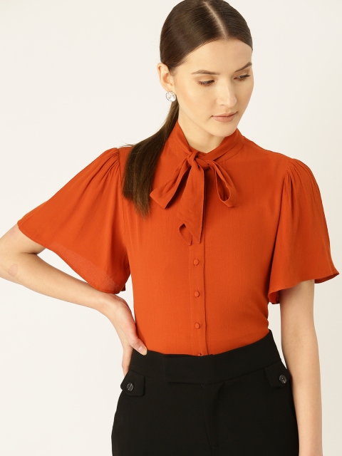 

COVER STORY Women Rust Orange Solid Top