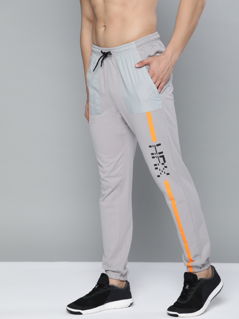 

HRX by Hrithik Roshan Men Wet Weather Slim Fit Bio-Wash Antimicrobial Lifestyle Joggers, Grey melange