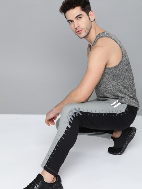 

HRX by Hrithik Roshan Men Monument Solid Slim fit Antimicrobial Lycra Running Track Pants, Black