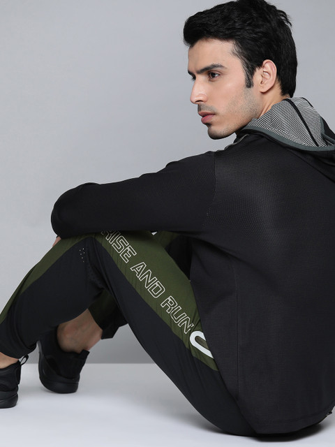 

HRX by Hrithik Roshan Men Green & Black Slim fit Antimicrobial Lycra Running Track Pants, Olive