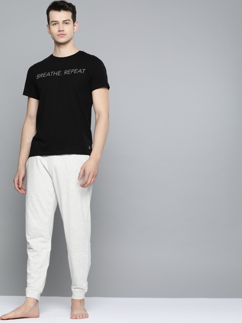 

HRX by Hrithik Roshan Men Ecru Melange Solid Regular Fit Melange Antimicrobial Yoga Jogger, Grey melange