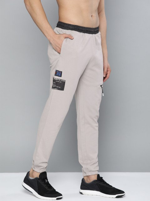 

HRX by Hrithik Roshan Men Grey Solid Slim Fit Bio-Wash Antimicrobial Lifestyle Joggers