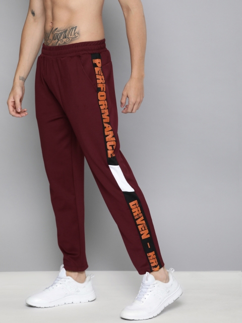 

HRX by Hrithik Roshan Men Maroon Solid Antimicrobial Rapid-Dry Training Track Pants