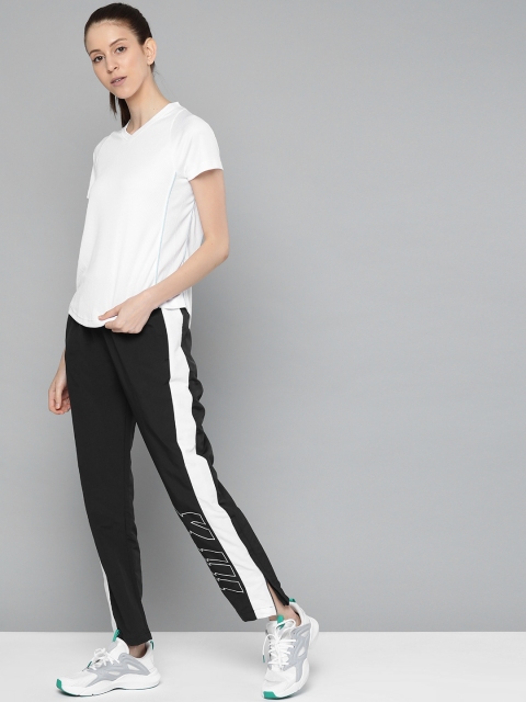 

HRX by Hrithik Roshan Women Black Solid Regular Fit Antimicrobial Lifestyle Track Pants