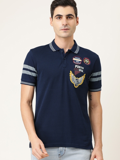 

Moda Rapido Men Navy Blue Solid Polo Collar T-shirt with Sleeve Stripes & Applique Detail