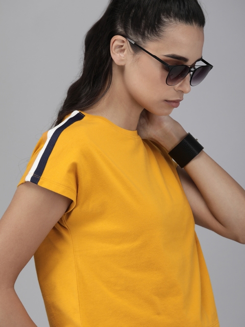 

Roadster Women Yellow Solid Round Neck T-shirt with Side Stripes