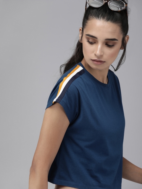 

Roadster Women Blue Solid Round Neck T-shirt with Side Stripes