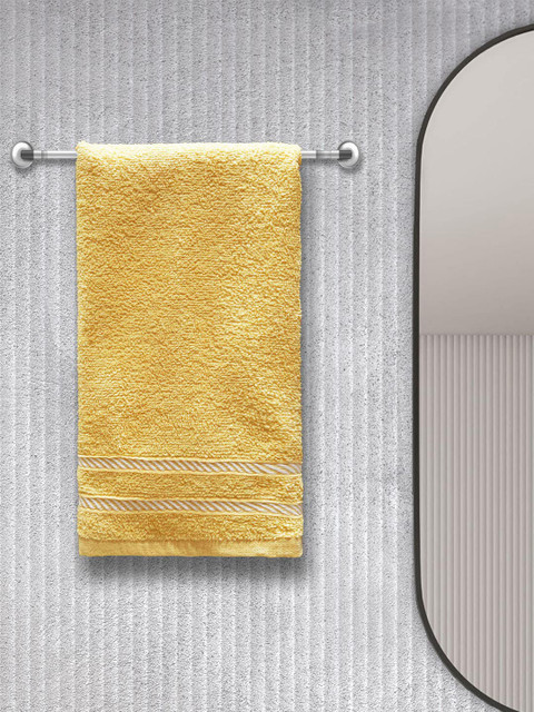 

Trident Unisex Set Of 4 Yellow & White Solid Comfort Living 380 GSM Hand Towels