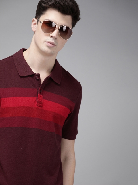 

Roadster Men Burgundy & Red Striped Polo Collar T-shirt