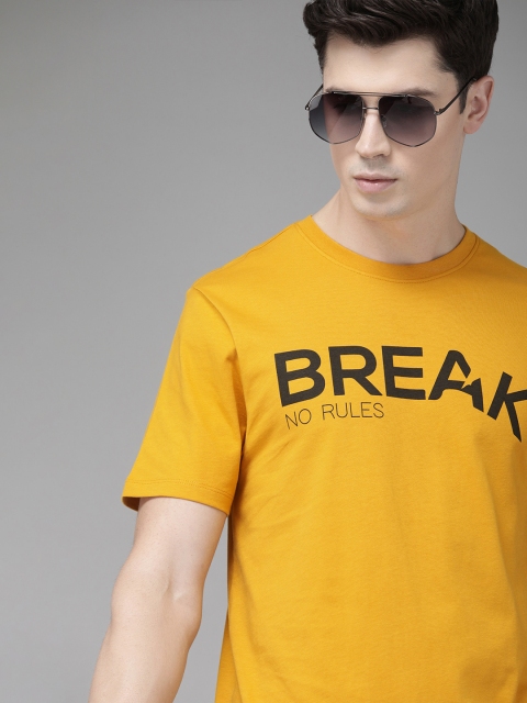 

Roadster Men Mustard Yellow Printed Polo Collar T-shirt