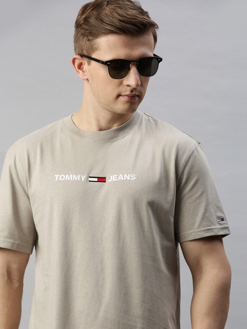 

Tommy Hilfiger Men Beige Solid Round Neck T-shirt with Logo Print Detail