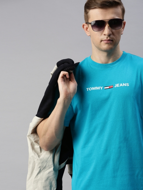 

Tommy Hilfiger Men Turquoise Blue Solid Round Neck T-shirt with Logo Print Detail
