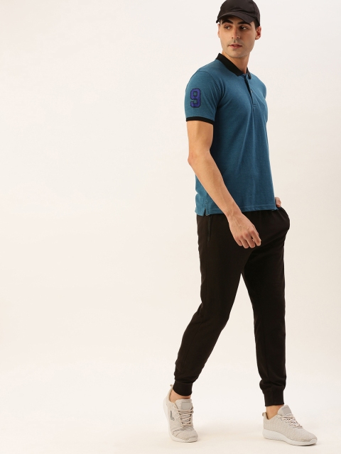 

Sports52 Wear Men Teal Blue & Black Solid Track Suit